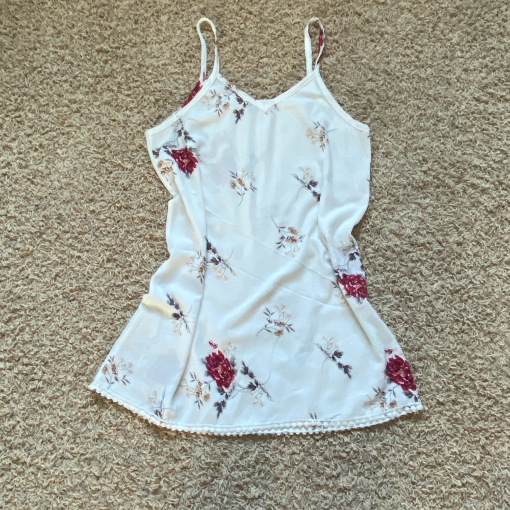 White /cream with red flower flowing dress.